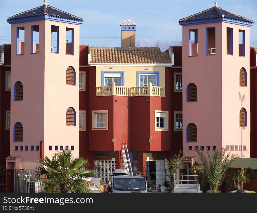 Pink and Terracotta Buildings by Port