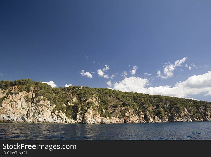 Mediterranean linecost with blue sky. Plenty of space for copy. Mediterranean linecost with blue sky. Plenty of space for copy.