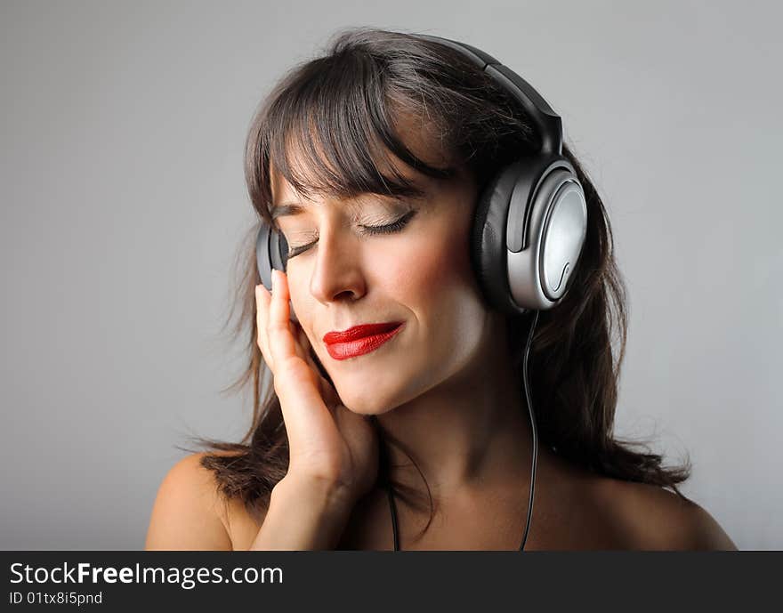 Portrait of beautiful girl with earphones. Portrait of beautiful girl with earphones