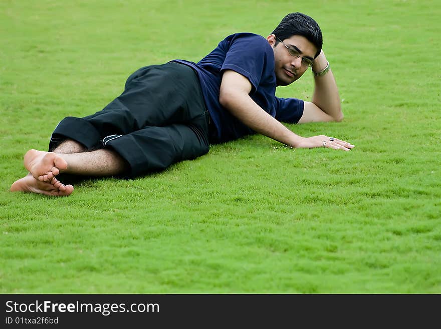 Men Relaxation Over Grass