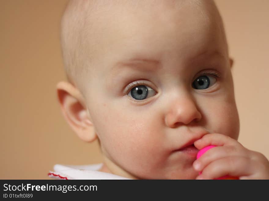 Dreaming baby with toy