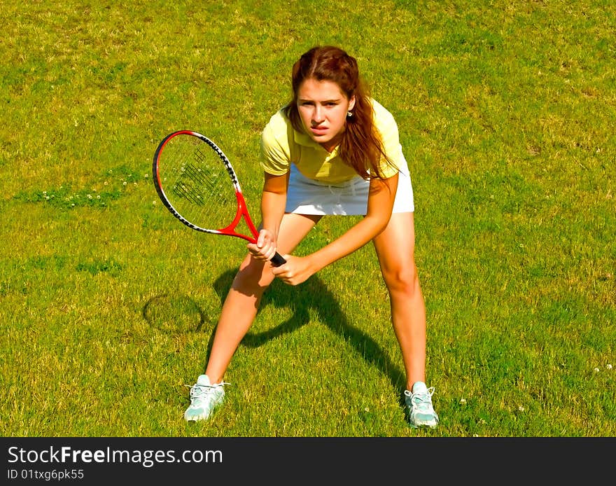 Young sports woman with racket. Young sports woman with racket