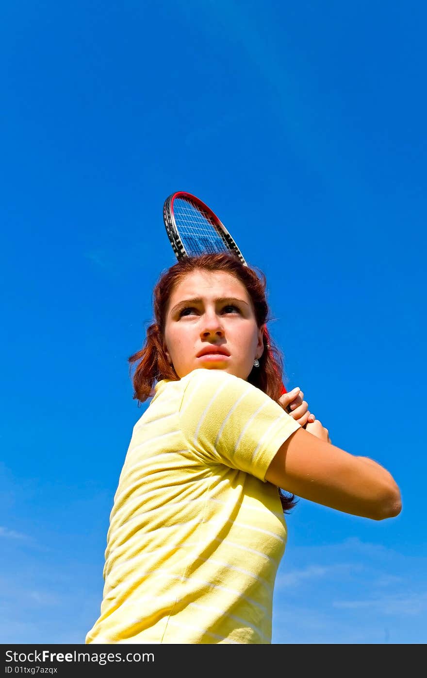 Portrait of young woman with racket. Portrait of young woman with racket