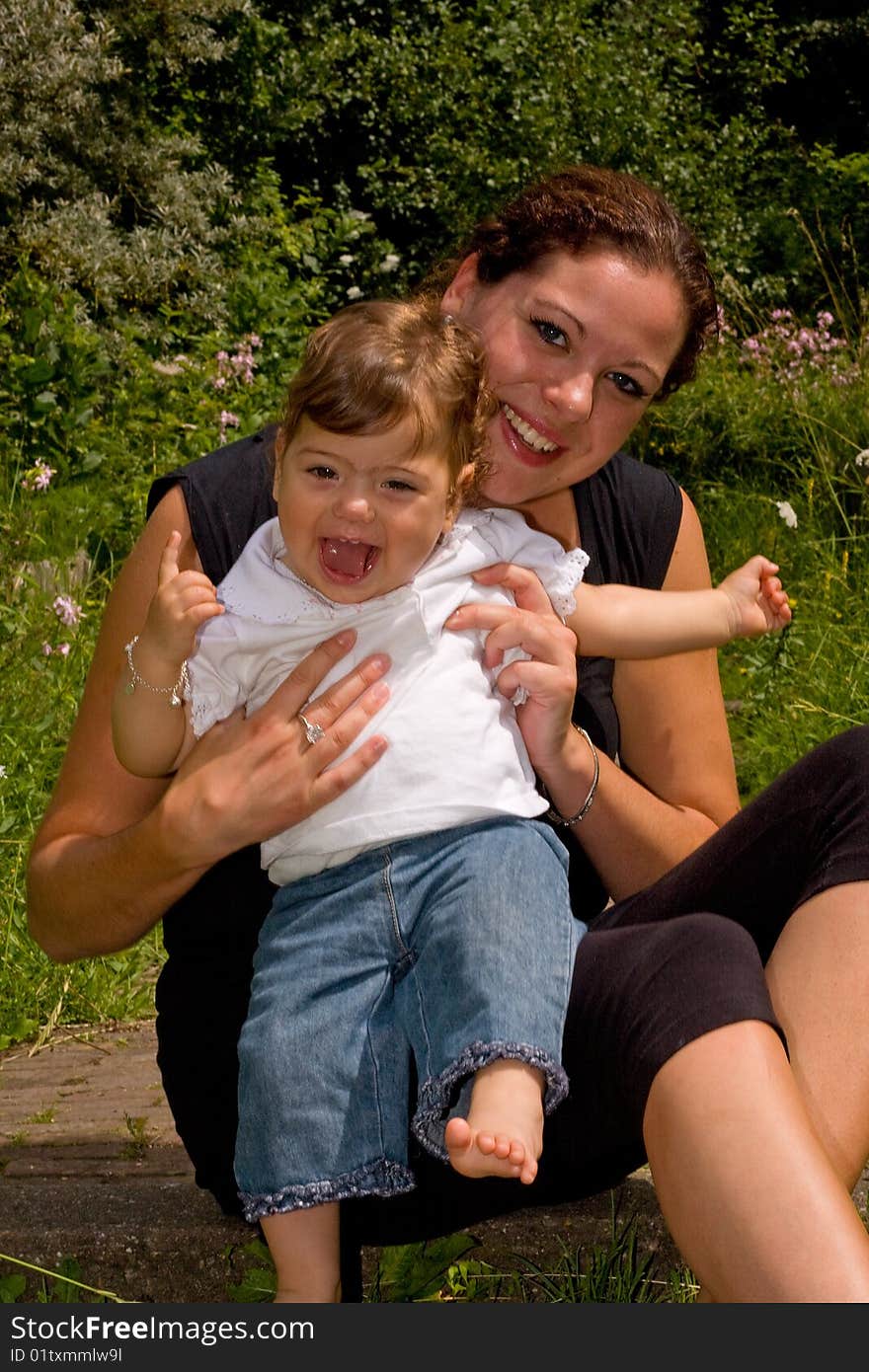 Mother and daughter laughing