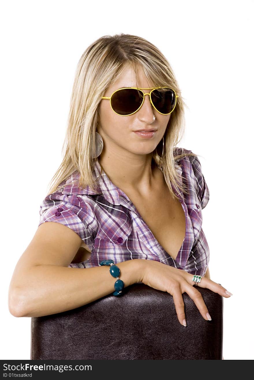 Beautiful young blond woman with sun glasses