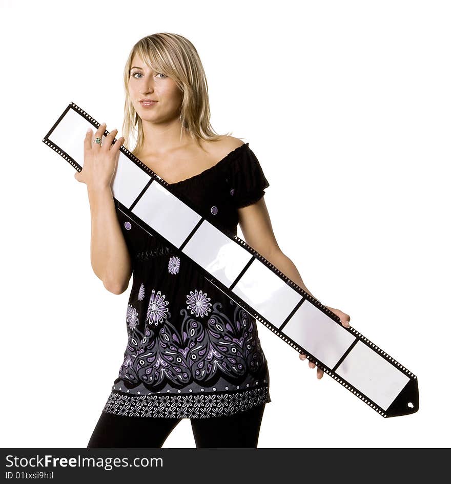 Beautiful young woman holding blank film strip