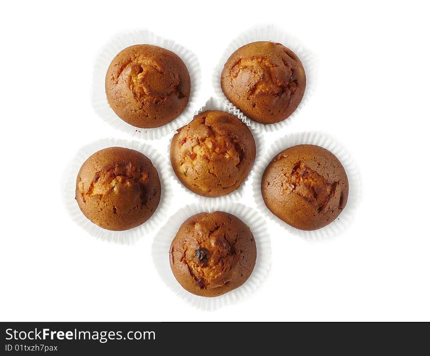 Fruit cupcakes isolated over white background. Shallow dof.