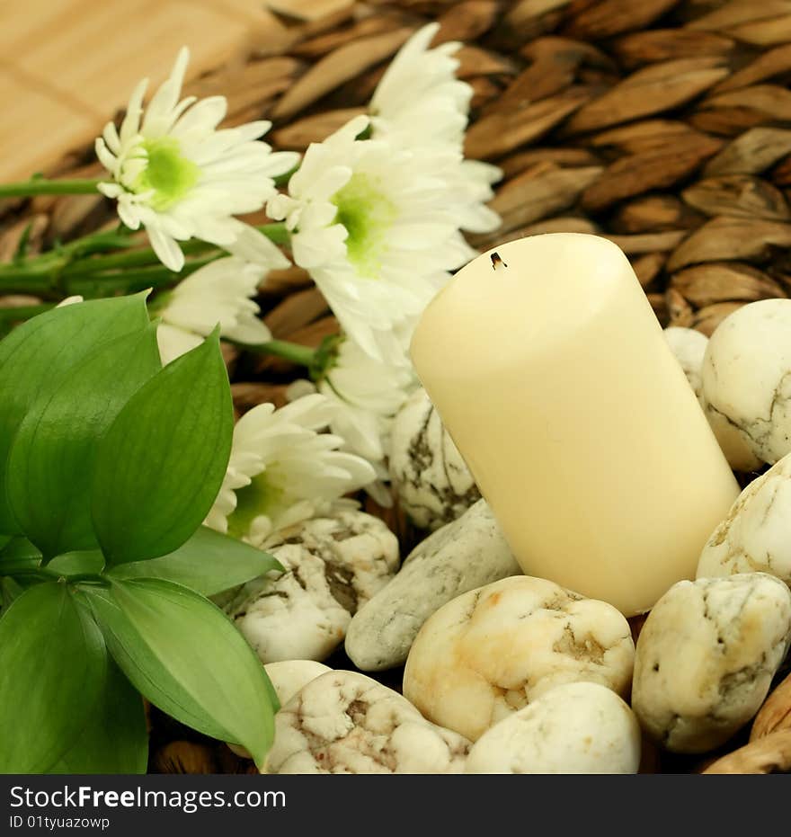 Spa Concept. Candle, Stones And Flowers.