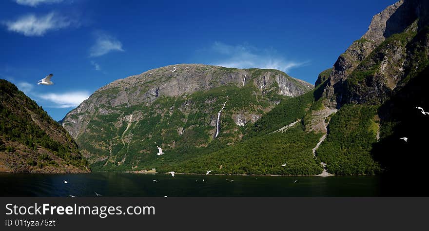 Norway’s longest and deepest fjord, the Sognefjord, lies in the heart of the Norwegian fjord country called Fjord Norway and extends more than 200 km inland to the national parks of Jotunheimen and Jostedalsbreen. Norway’s longest and deepest fjord, the Sognefjord, lies in the heart of the Norwegian fjord country called Fjord Norway and extends more than 200 km inland to the national parks of Jotunheimen and Jostedalsbreen.