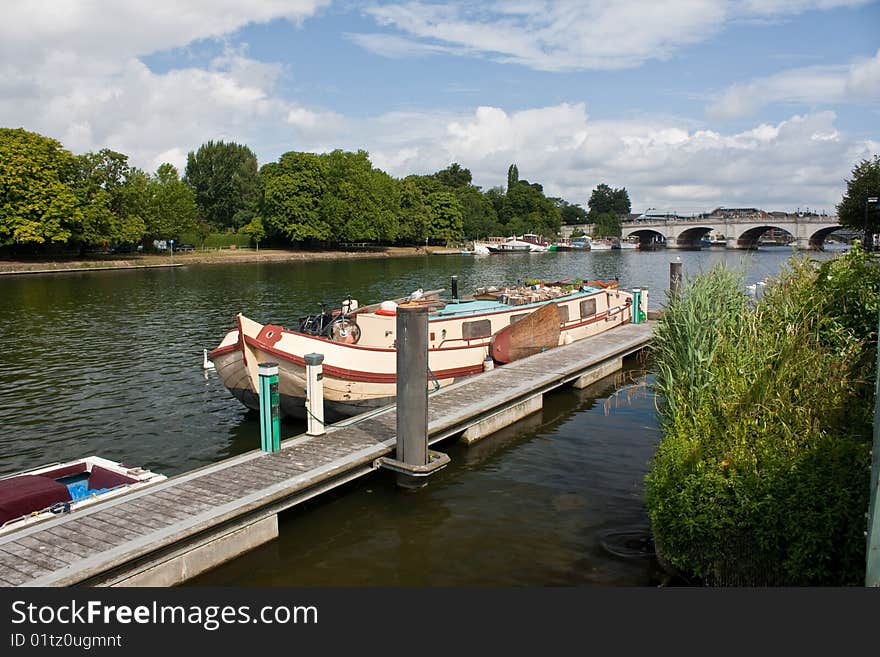 A houseboat moored on the River Thames