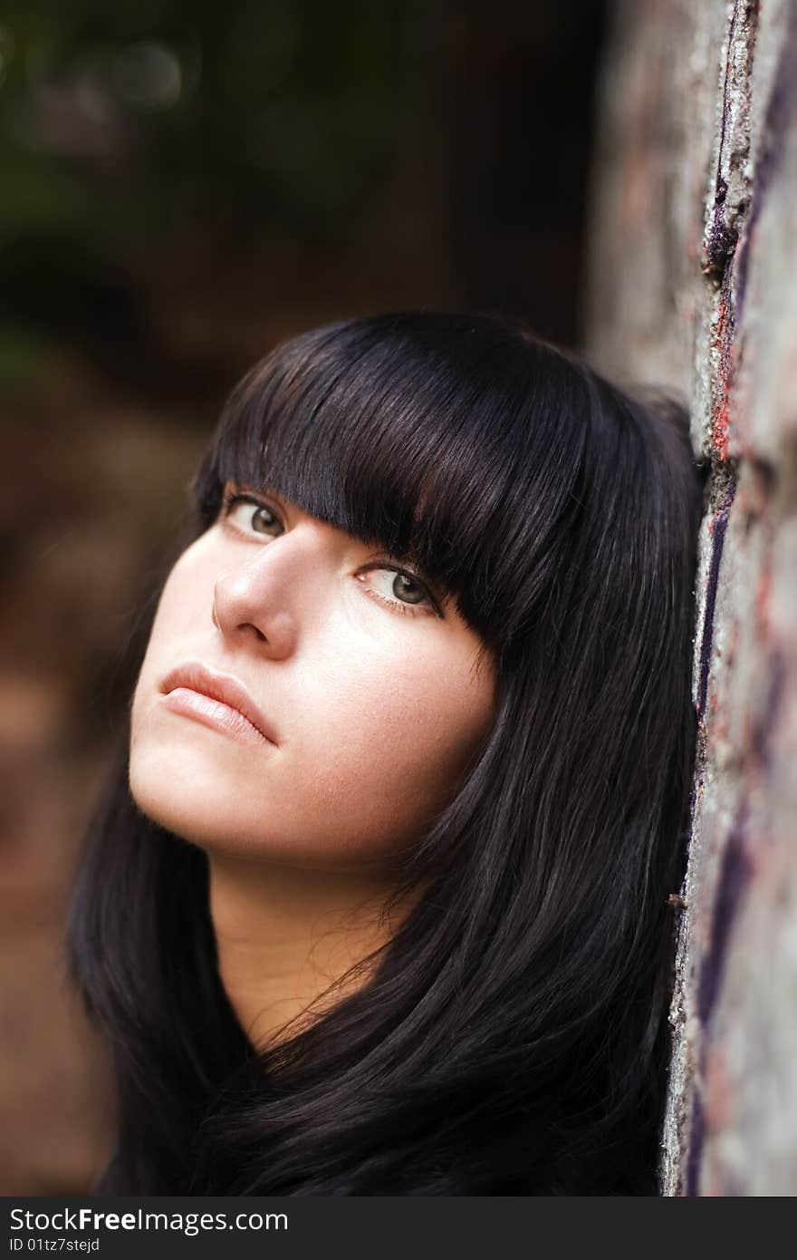 Portrait of  sad brownhaired  girl. Portrait of  sad brownhaired  girl