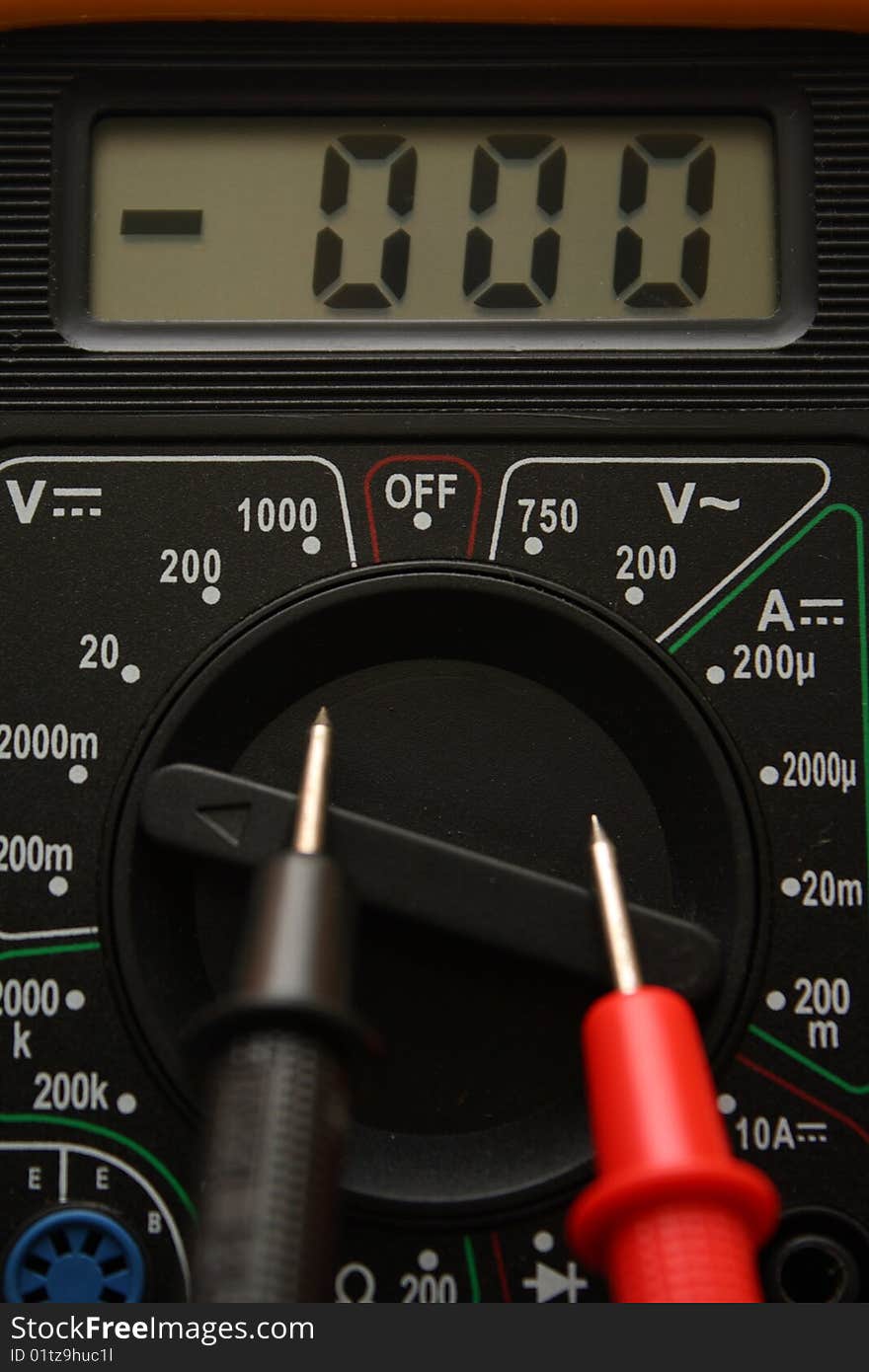 Black digital multimeter as a background