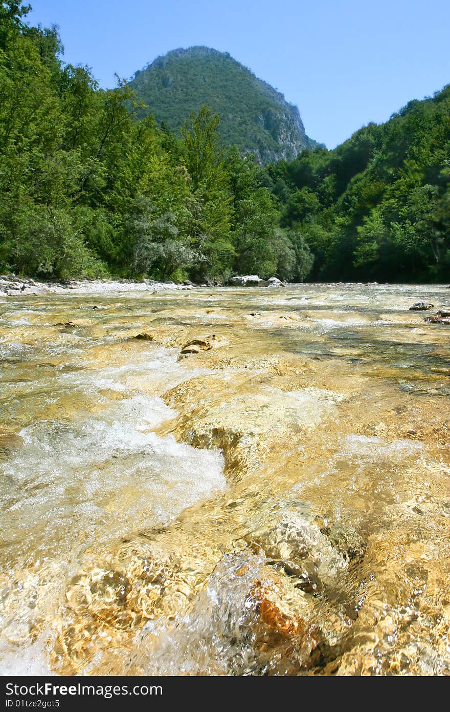 Beautiful golden  water of river Rakitnica