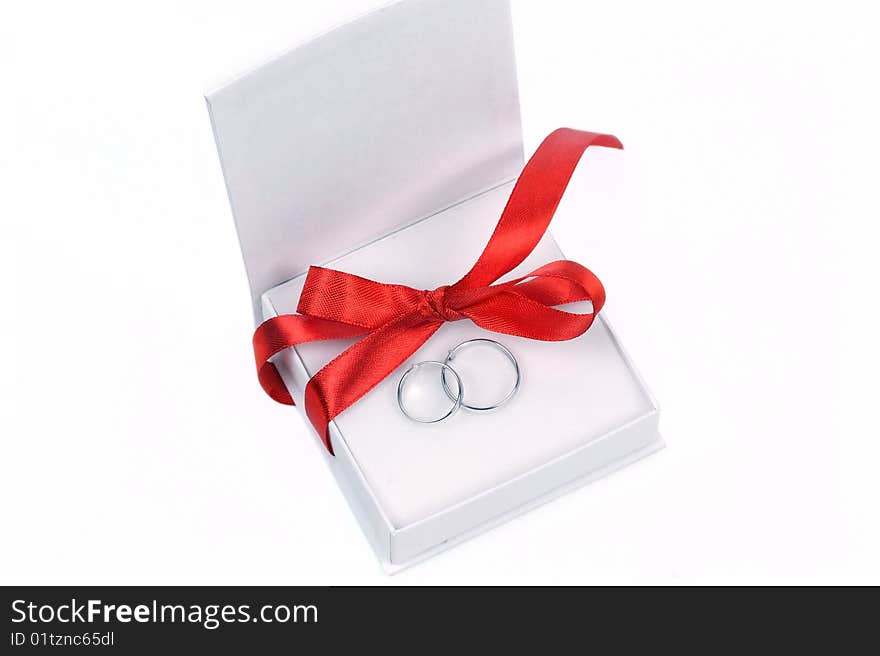 Rings in white box