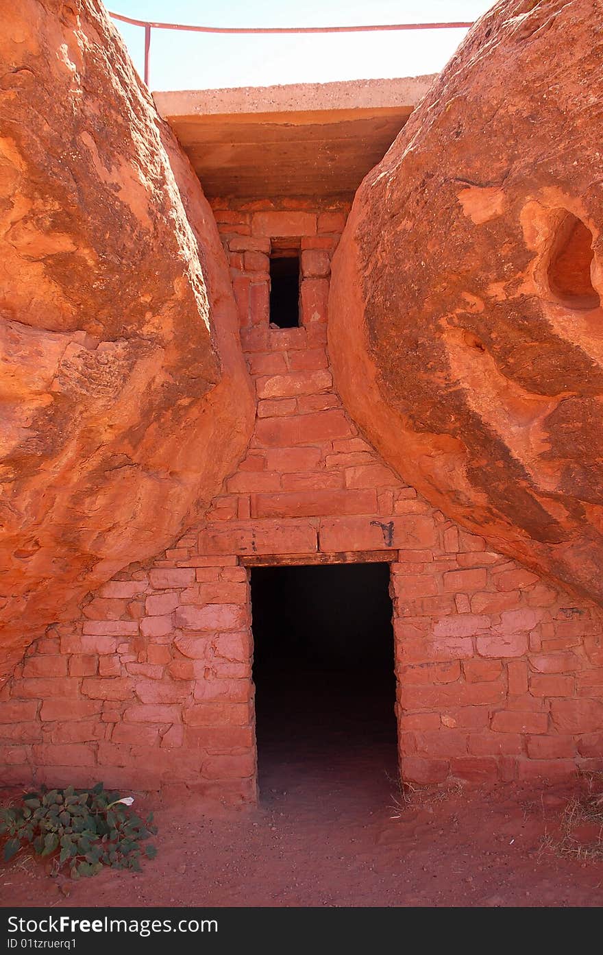 Cave door into a dark ancient dwelling