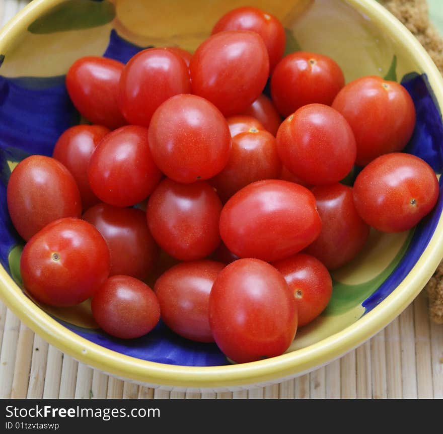 Some sweet cocktail tomatoes in a bowl
