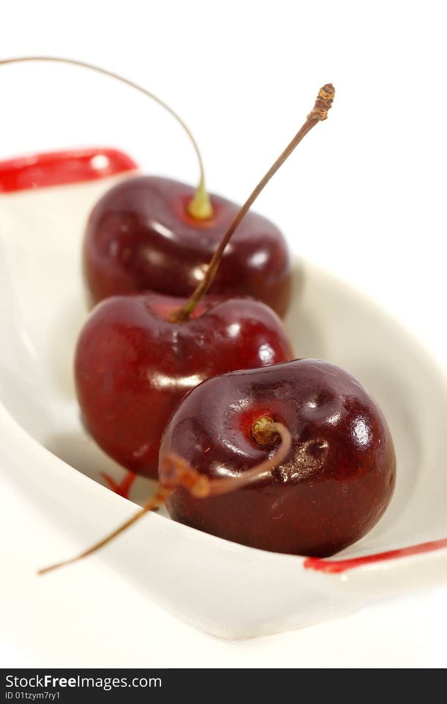 Close capture Fresh Cherry on white background. Close capture Fresh Cherry on white background