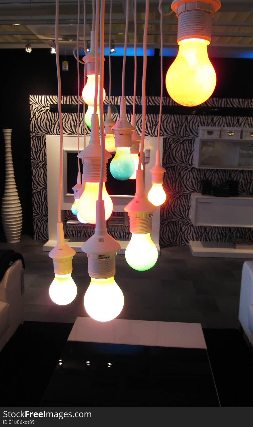 Many modern colored lights with white sockets