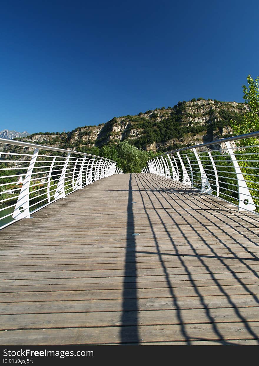 Bridge across river Sarca in Torbole, Trentino, Italy