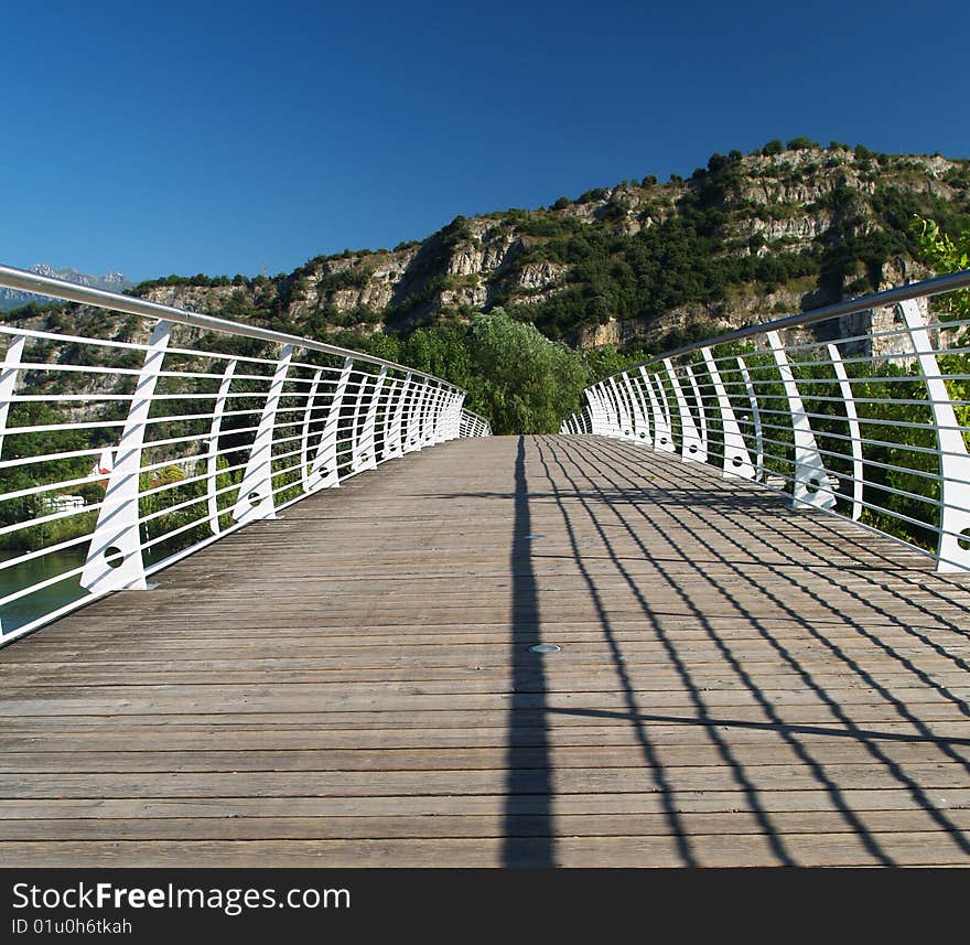 Bridge across river Sarca in Torbole, Trentino, Italy