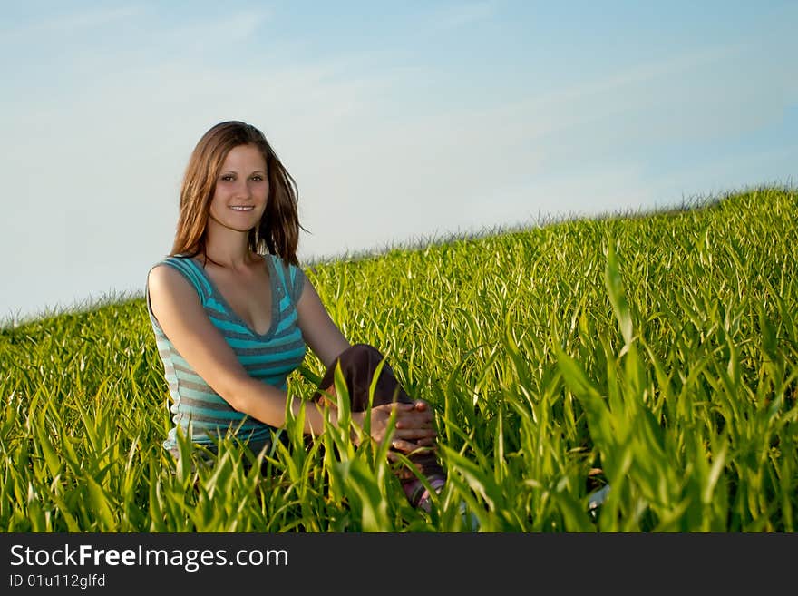 Woman sitting on grass