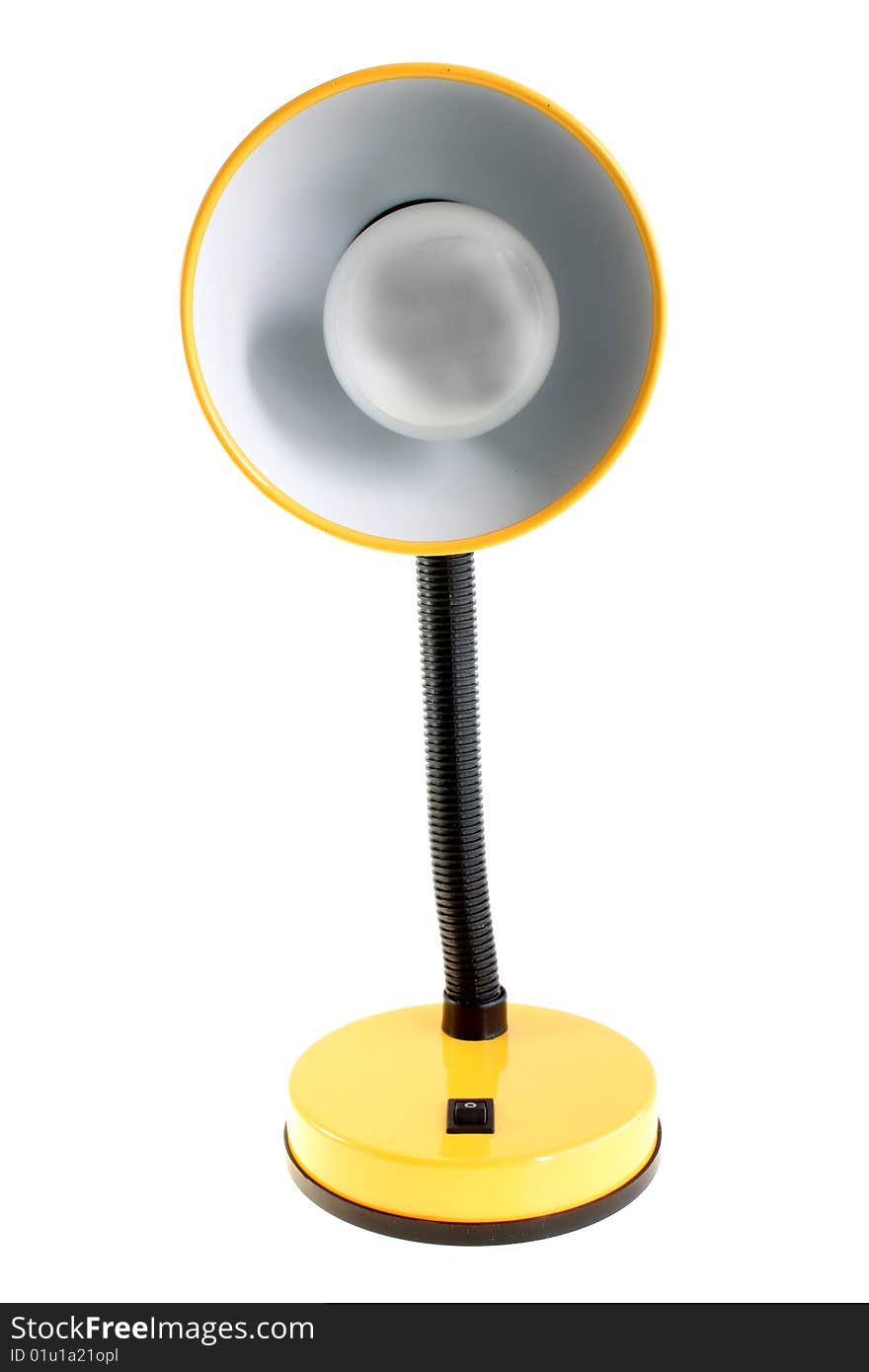 Yellow desk lamp on a white background, it is isolated.