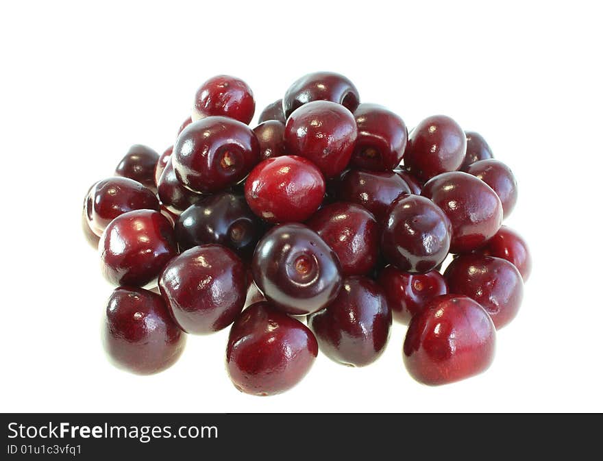 Red sweet cherry on a white background, it is isolated.