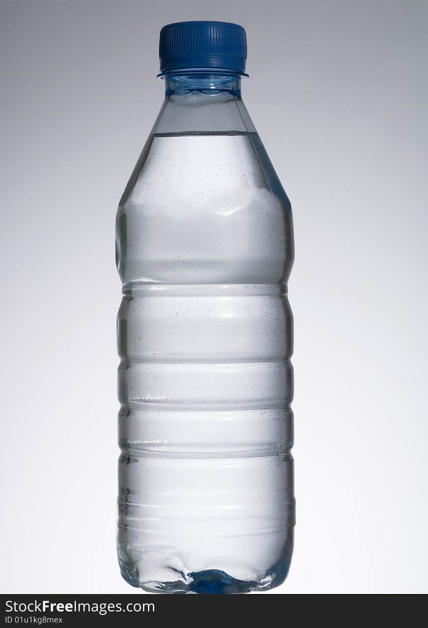 Bottled water isolated over a white background