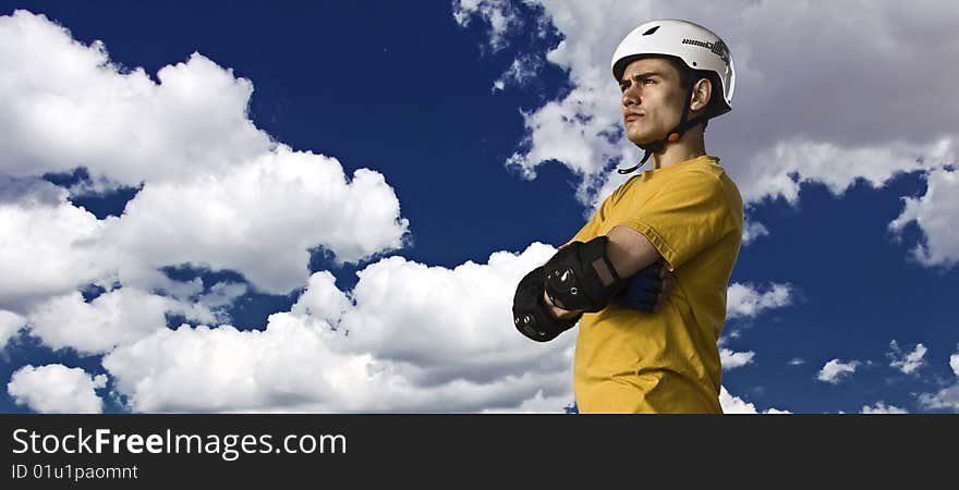 Young man in helmet and protective gear