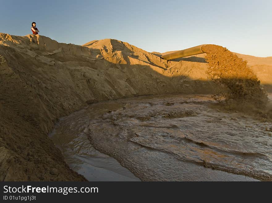 Mud coming out of big pipe