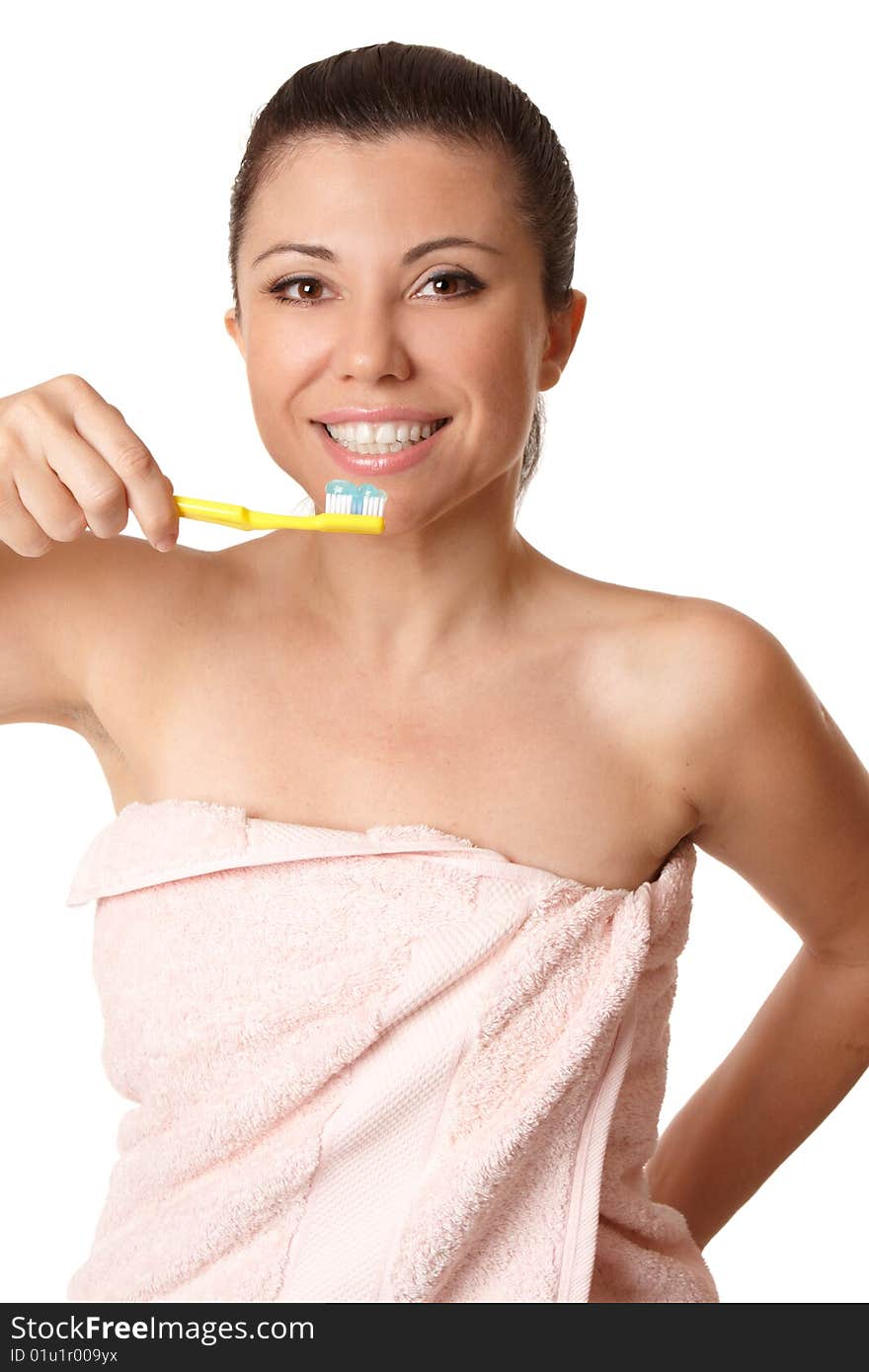 Smiling woman holding a toothbrush