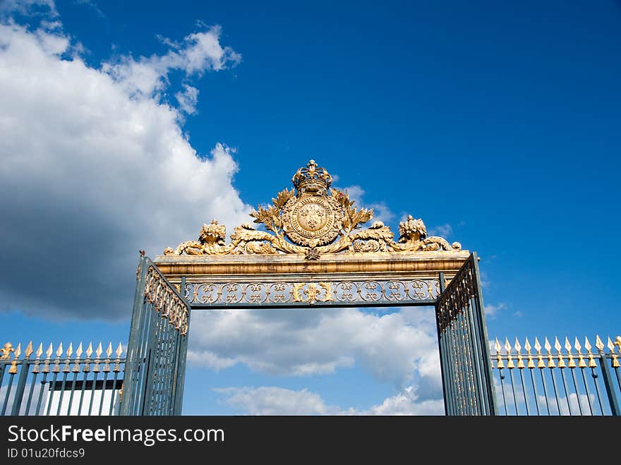 Golden Gate against blue sky in Paris Palace