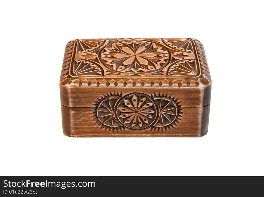 Closed carved wooden casket isolated