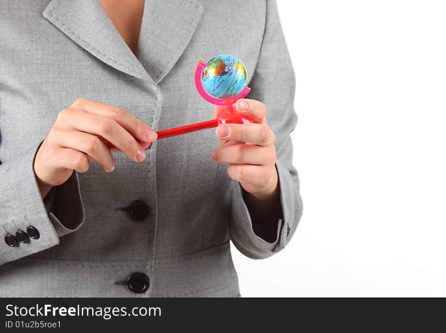 Woman's hands with small globe pencil sharpener