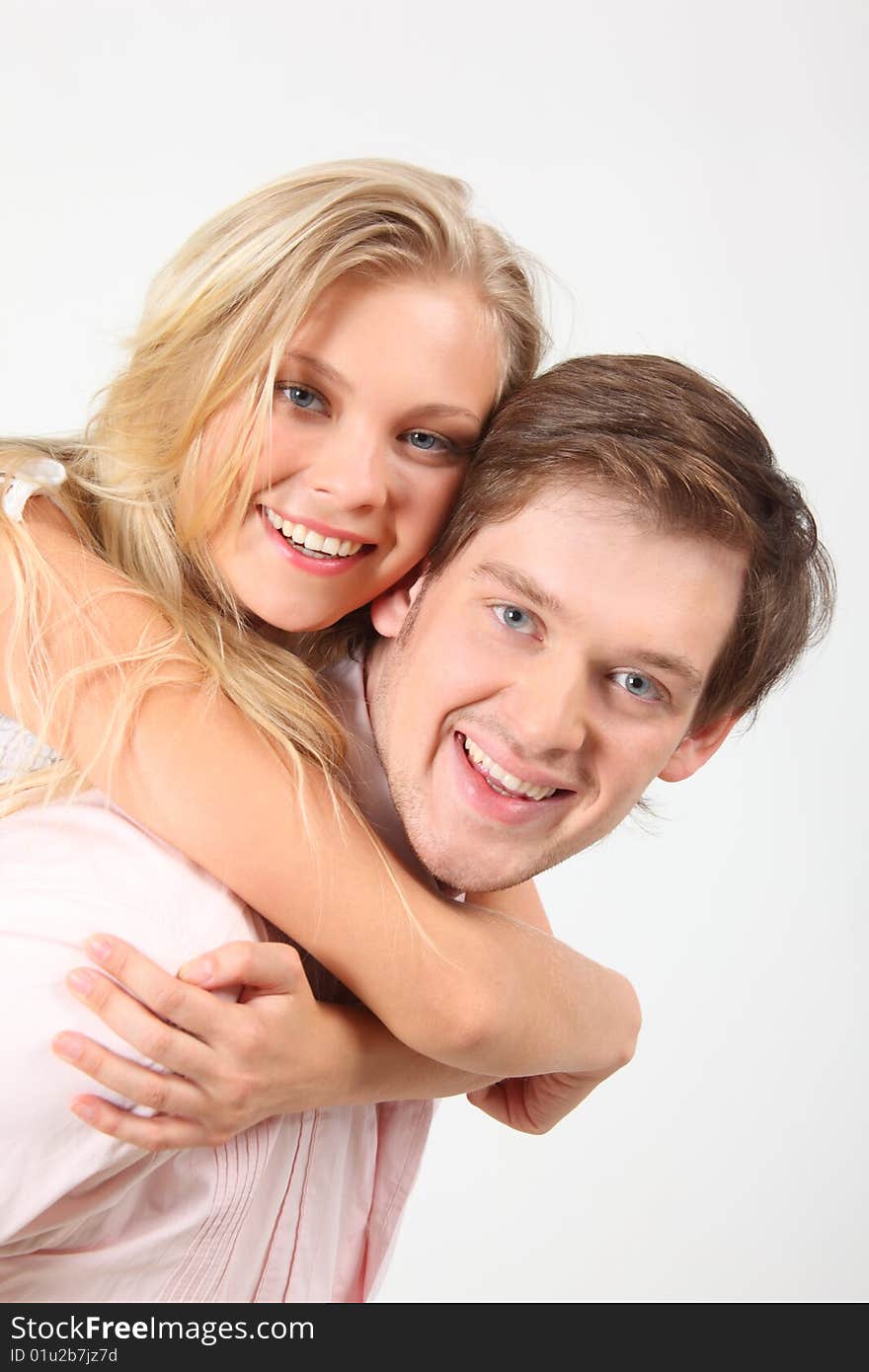 Girl Embraces Young Man For Neck Behind