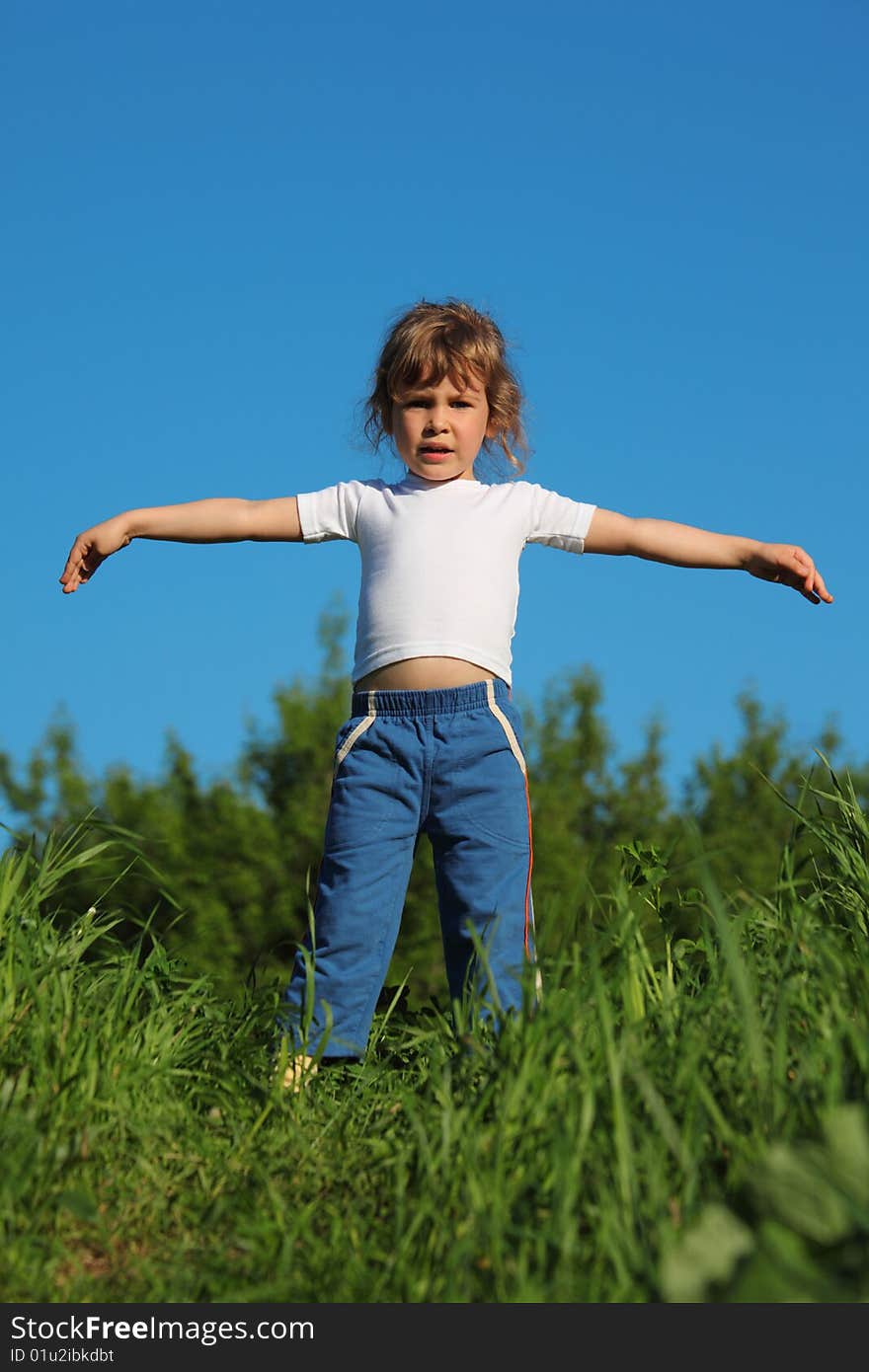 Girl Makes Gymnastic In Grass