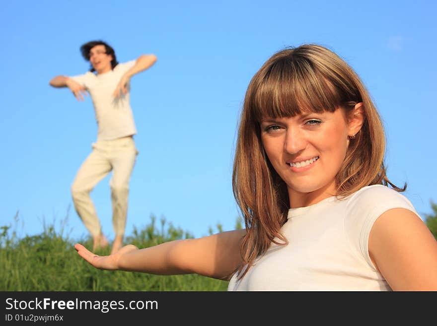 Girl Holds  Guy On  Palm