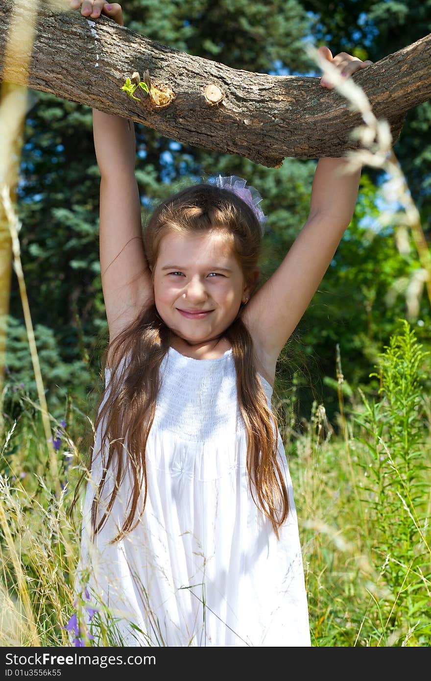 girl  hangs on a tree