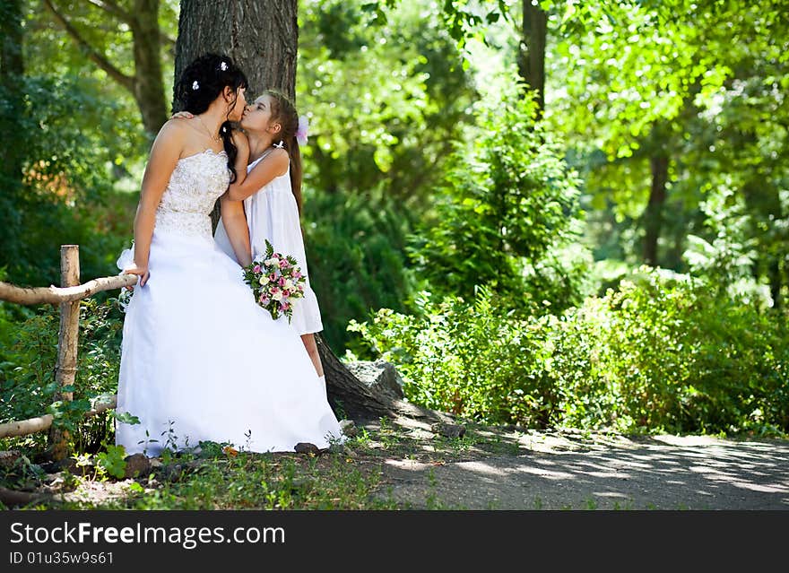 bride kisses the daughter