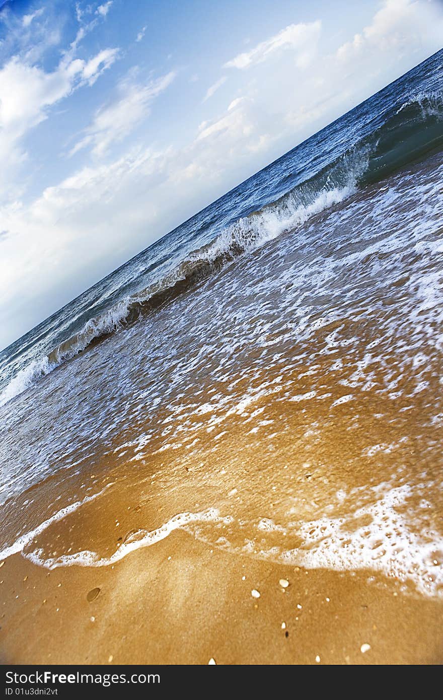 Beautiful seashore with coastal waves.