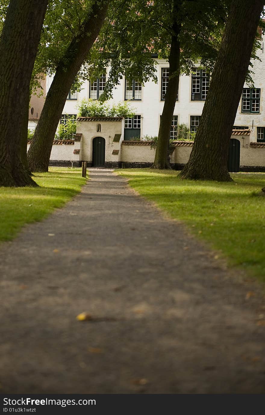 Path leading to a row of ancient houses