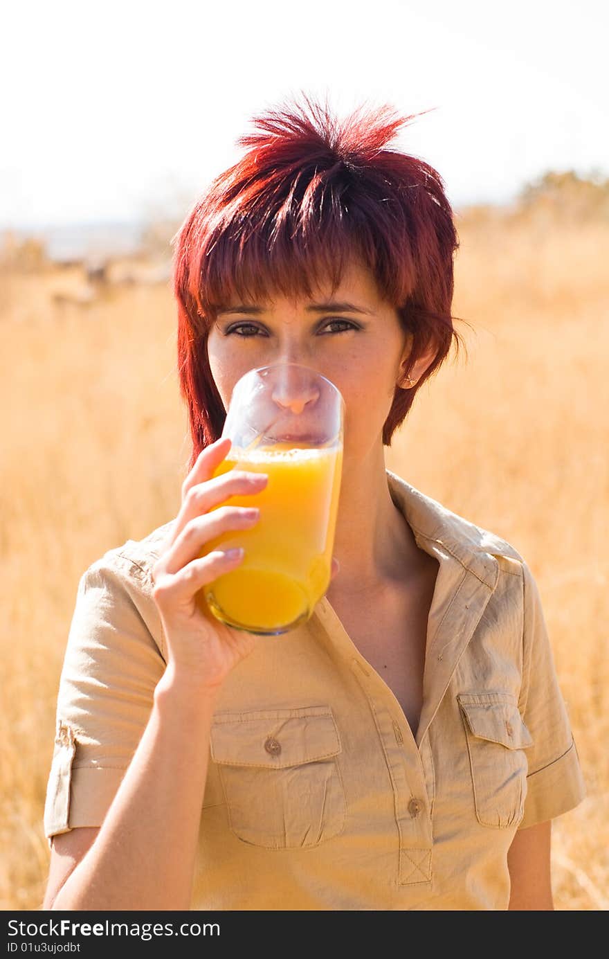 Woman drinking orange juice