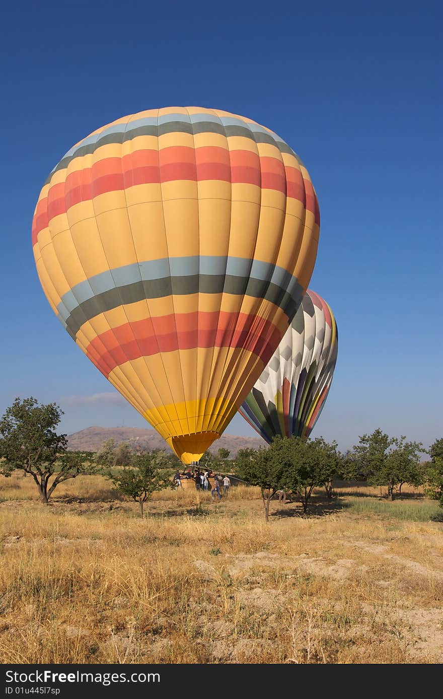 Yellow Balloon in Anatolia, Turkey, summer day, deep sky