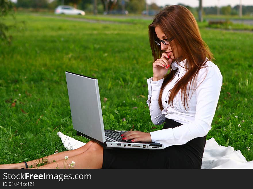 Beautiful Young Woman Studing In Park