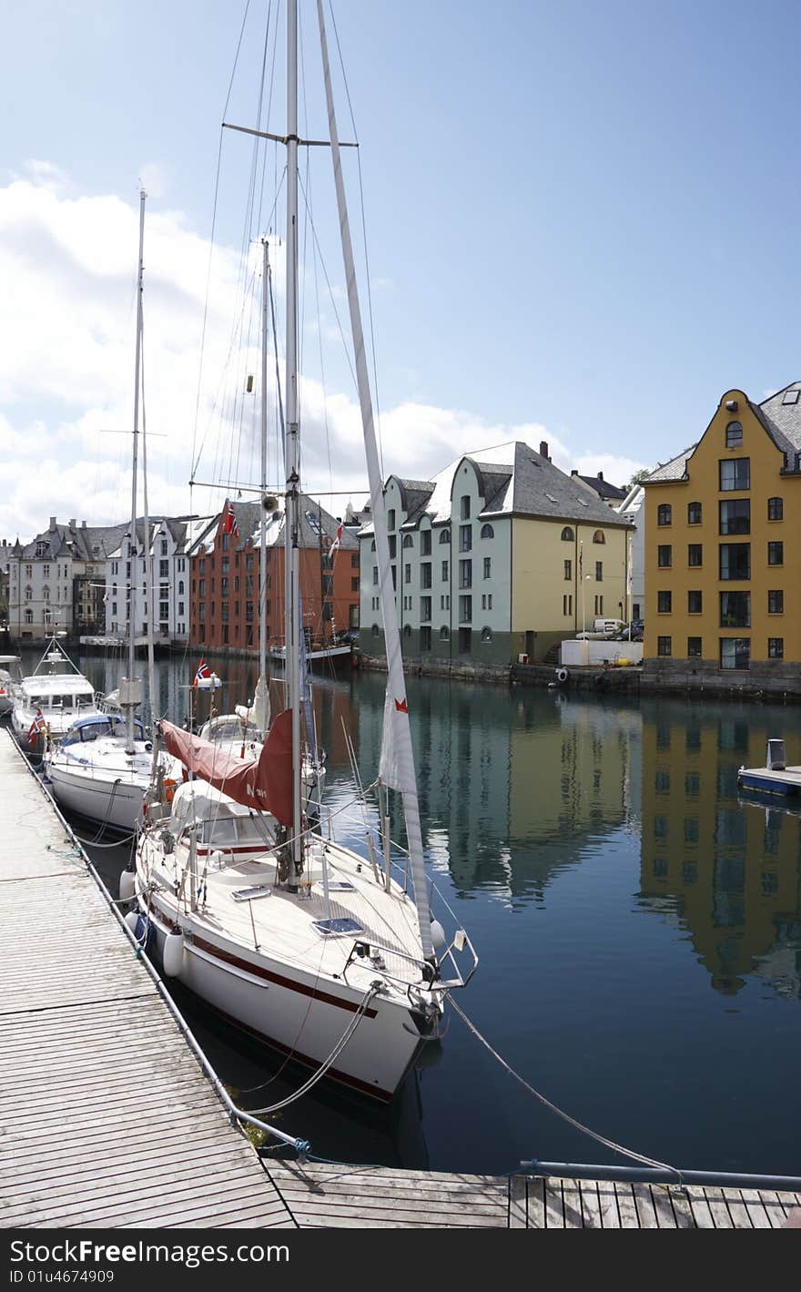 Boats in a river near buildings