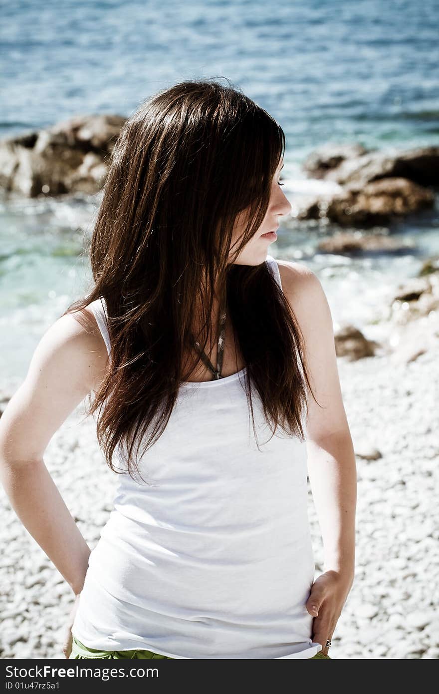 Young long haired woman on the beach. Young long haired woman on the beach