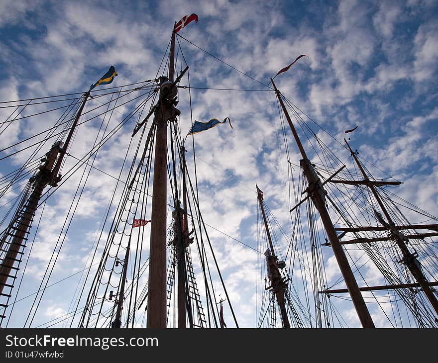 Sailing masts of traditional vintage wooden tall ships. Sailing masts of traditional vintage wooden tall ships