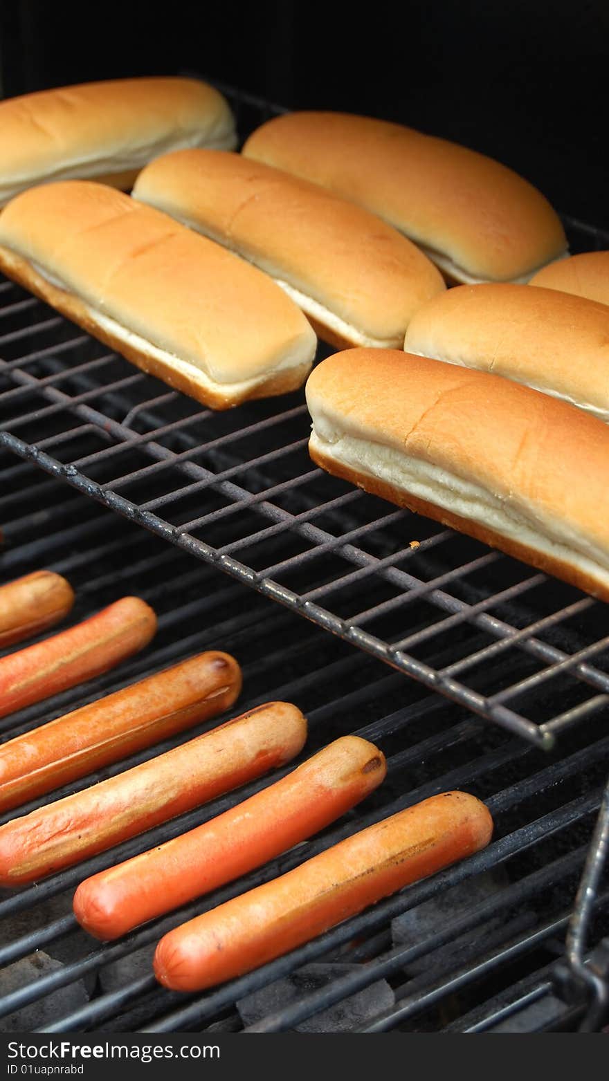 Hot Dog Sausages On Barbecue