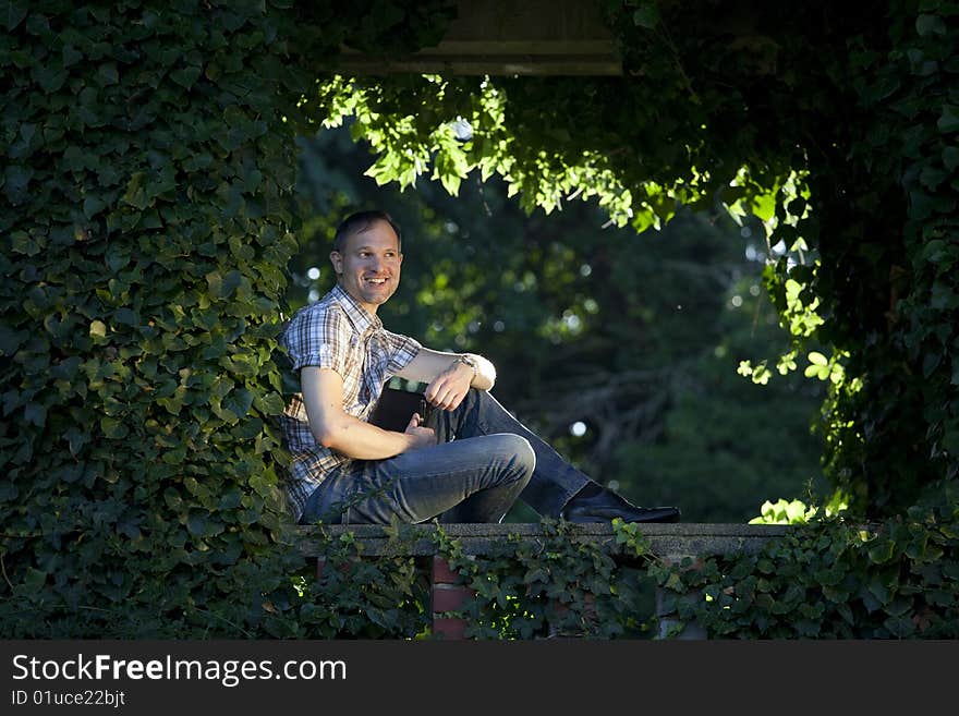 Happy Man With Diary In Green