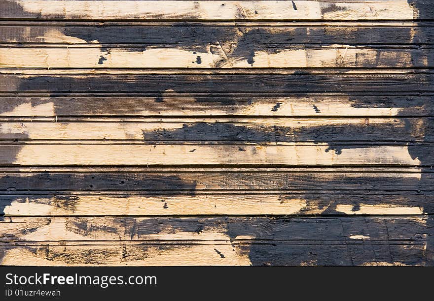 Plank background of old dirty weathered wood. Plank background of old dirty weathered wood